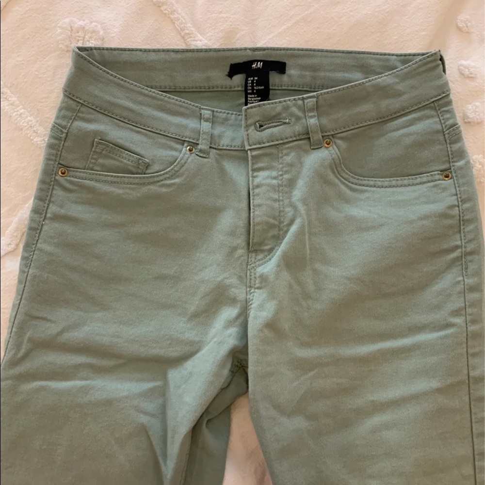 Green skinny jeans